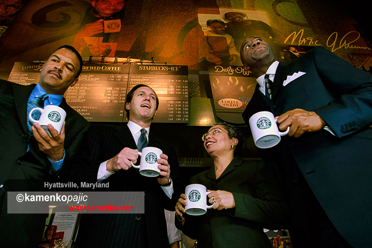 Starbucks/JDC store partners toasting during Grand Opening