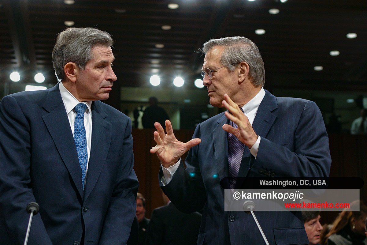 Paul Wolfowitz speaks with Donald Rumsfeld