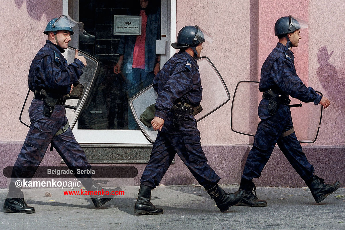 Police officers greeted by bystanders after departing their positions